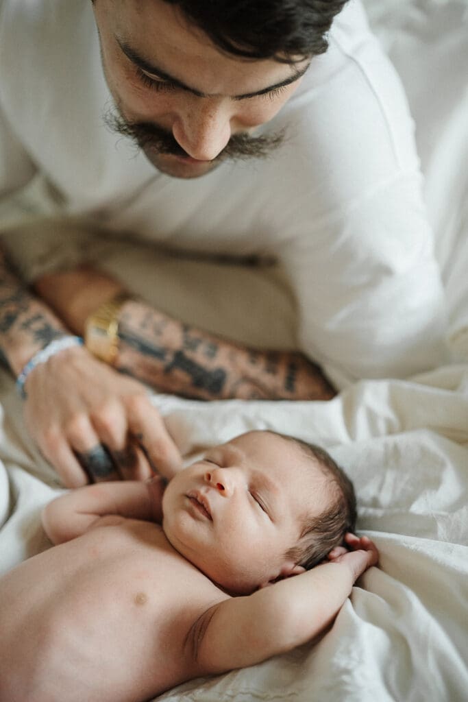 dad and newborn poses that are natural